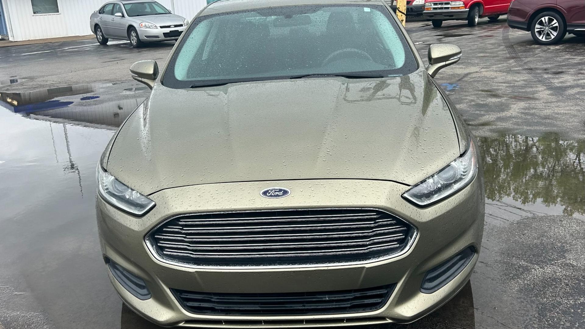 2013 GREEN /BLACK / GRAY Ford Fusion SE (3FA6P0H73DR) with an 2.5L 4CYL engine, 6-Speed Automatic transmission, located at 2710A Westlane Rd., Indianapolis, IN, 46268, (317) 291-2000, 39.885670, -86.208160 - Photo#1